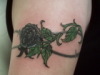 rose tat upper arm